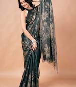 Green women ethnic motifs woven design saree