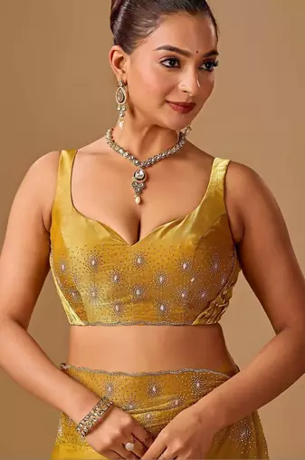 Yellow embellished beads and stones organza heavy work saree