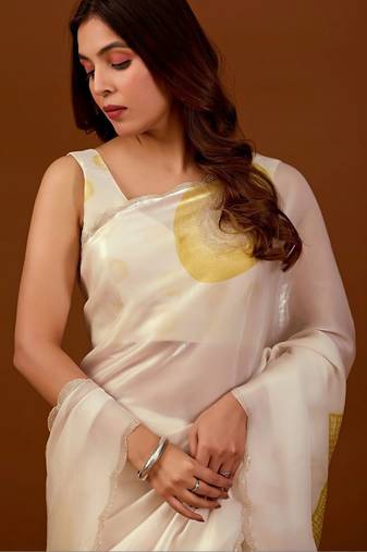 Off white sequinned organza saree