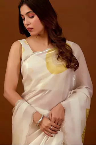 Off white sequinned organza saree