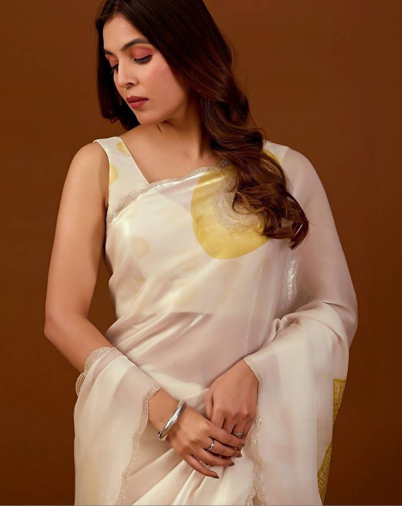 Off white sequinned organza saree