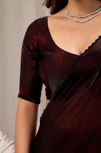 Maroon floral beads and stones organza saree