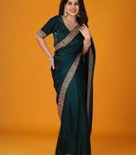 Teal embellished satin saree