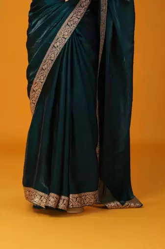 Teal embellished satin saree