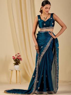 Teal floral sequinned organza saree 1