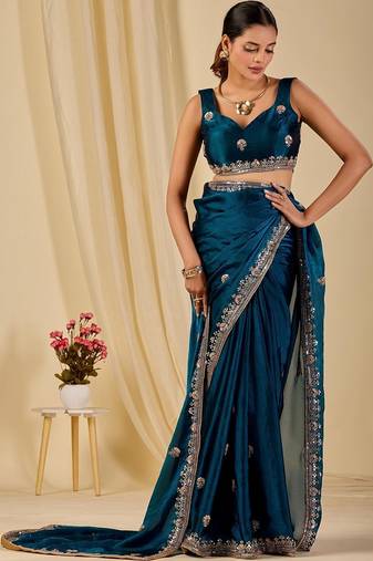 Teal floral sequinned organza saree