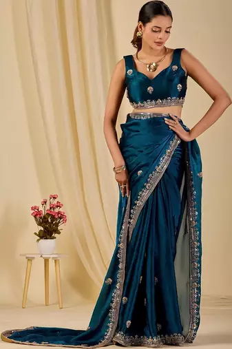 Teal floral sequinned organza saree