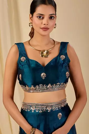 Teal floral sequinned organza saree