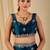 Teal floral sequinned organza saree