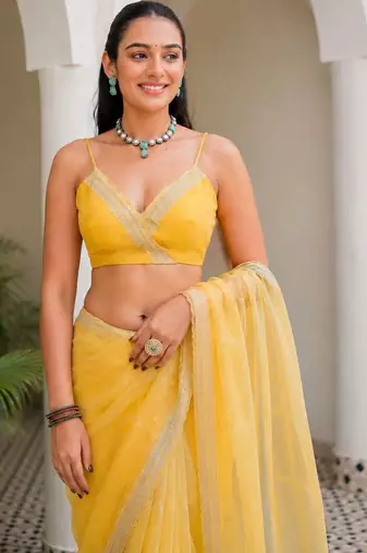 Yellow floral beads and stones tissue saree