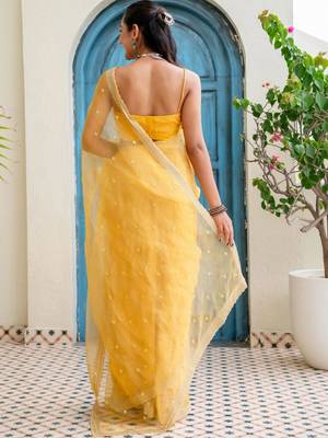 Yellow floral beads and stones tissue saree 5