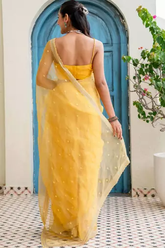 Yellow floral beads and stones tissue saree