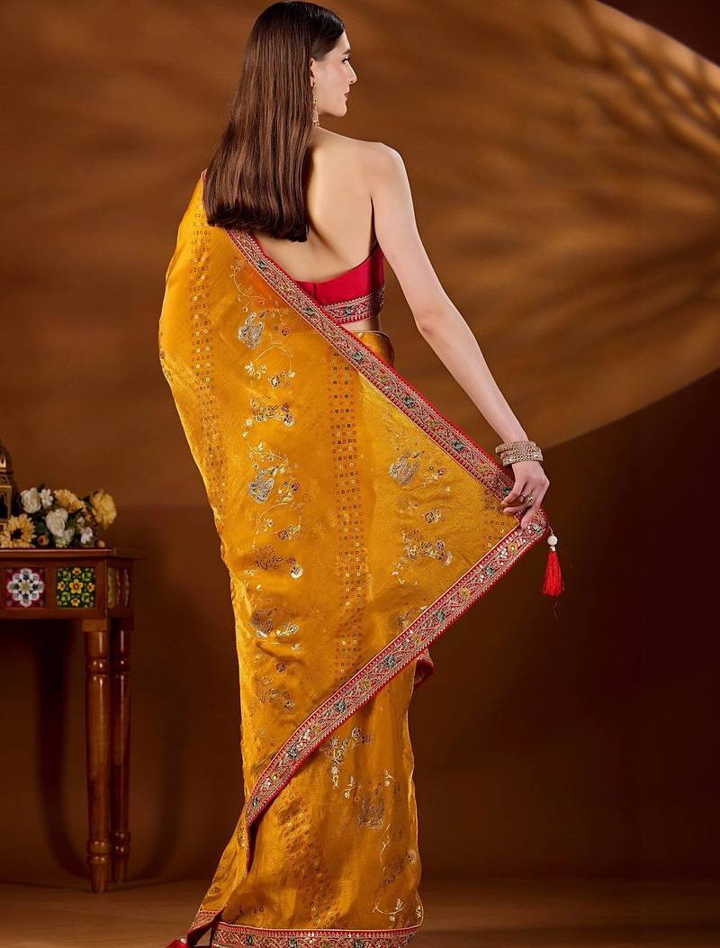 Yellow bandhani beads and stones organza saree