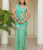 Sea green floral sequinned tissue saree