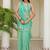 Sea green floral sequinned tissue saree