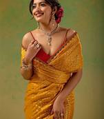 Mustard embellished zari tissue saree