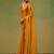 Mustard embellished zari tissue saree