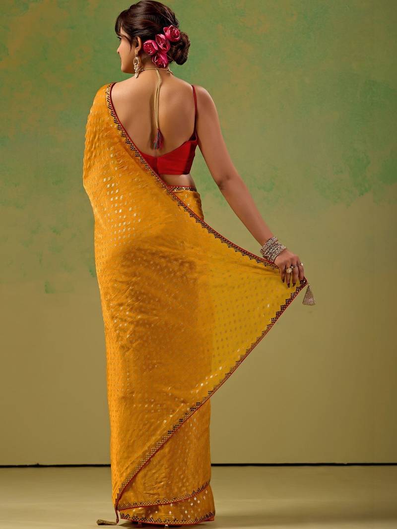Mustard embellished zari tissue saree