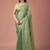 Green women ethnic motifs woven design saree