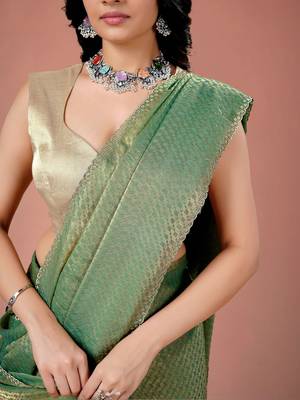 Green women ethnic motifs woven design saree 5