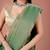 Green women ethnic motifs woven design saree