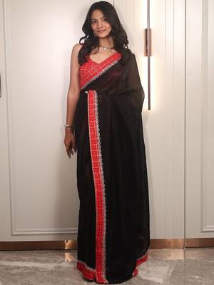 Black ethnic motifs embroidered satin saree 1