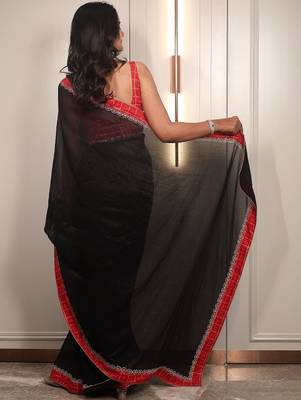 Black ethnic motifs embroidered satin saree 4