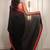 Black ethnic motifs embroidered satin saree