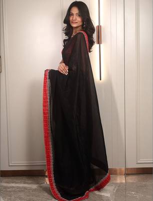 Black ethnic motifs embroidered satin saree 5