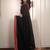 Black ethnic motifs embroidered satin saree