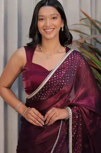 Burgundy ethnic motifs sequinned tissue heavy work saree
