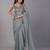 Sea green stonework embellished beads border silk saree with unstitched blouse