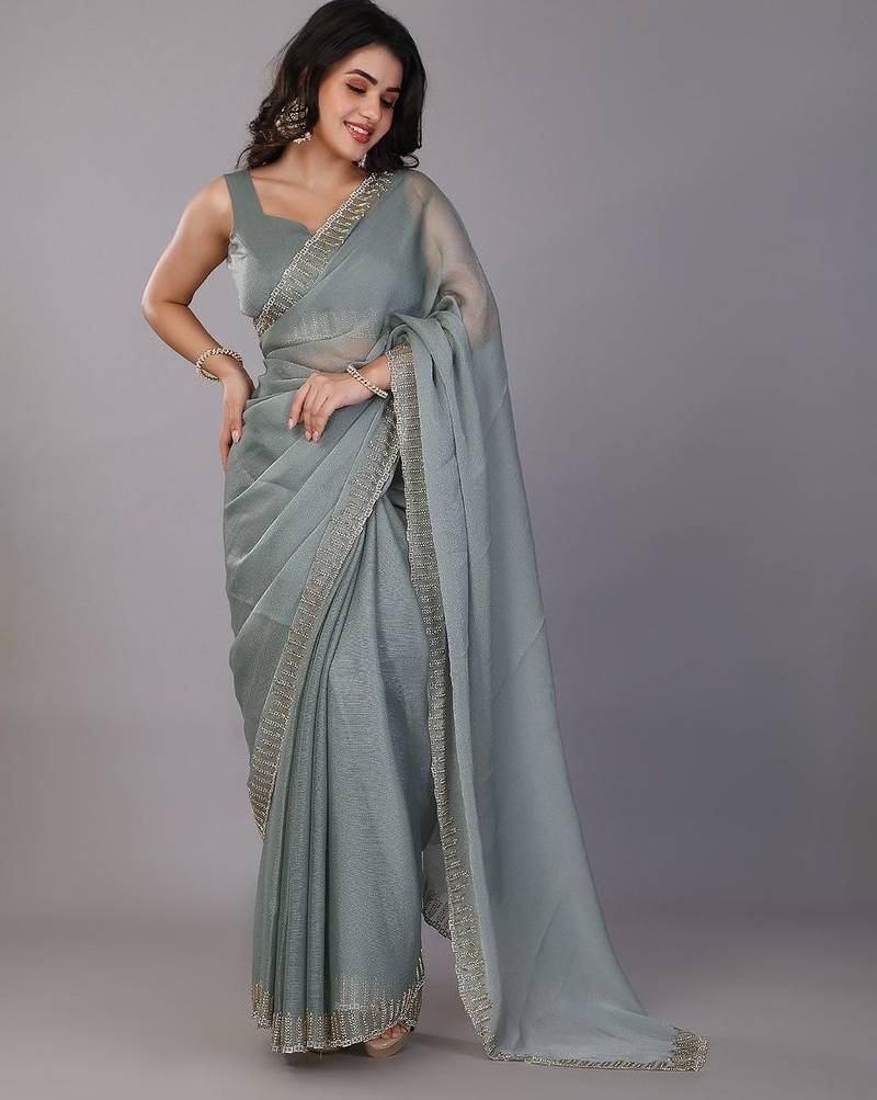 Sea green stonework embellished beads border silk saree with unstitched blouse