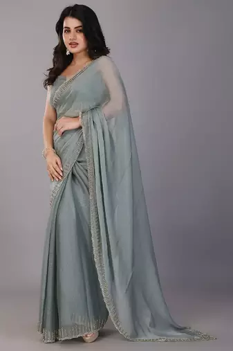 Sea green stonework embellished beads border silk saree with unstitched blouse