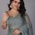 Sea green stonework embellished beads border silk saree with unstitched blouse