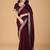 Maroon sequinned border satin saree with unstitched blouse