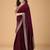 Maroon sequinned border satin saree with unstitched blouse