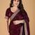 Maroon sequinned border satin saree with unstitched blouse