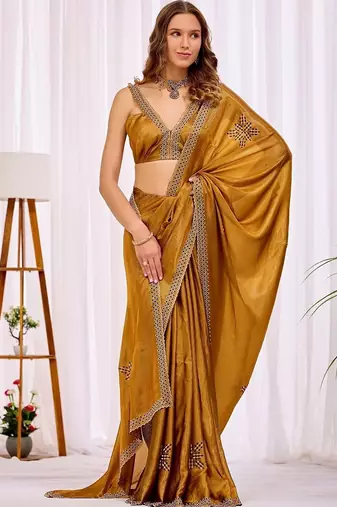 Gold beads and stones designer saree