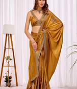 Gold beads and stones designer saree