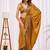 Gold beads and stones designer saree