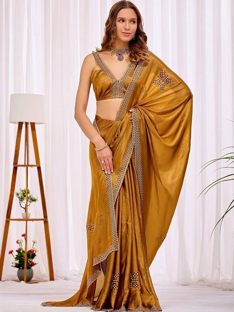Gold beads and stones designer saree