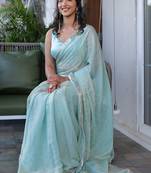 Turquoise sequinned silk cotton saree