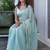 Turquoise sequinned silk cotton saree