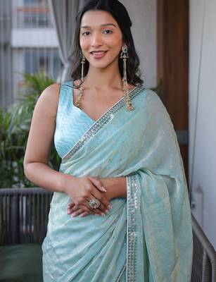Turquoise sequinned silk cotton saree 3