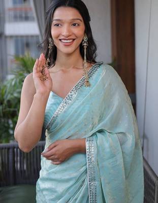 Turquoise sequinned silk cotton saree 4