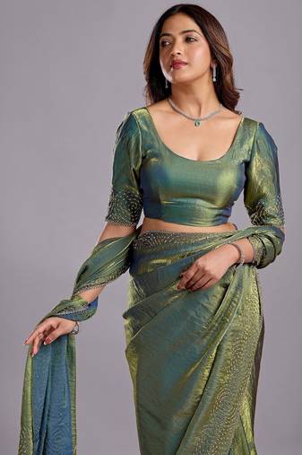 Green embellished sequinned organza heavy work saree
