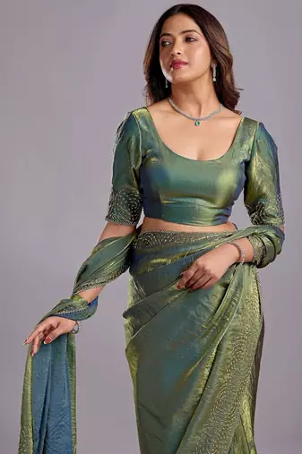 Green embellished sequinned organza heavy work saree