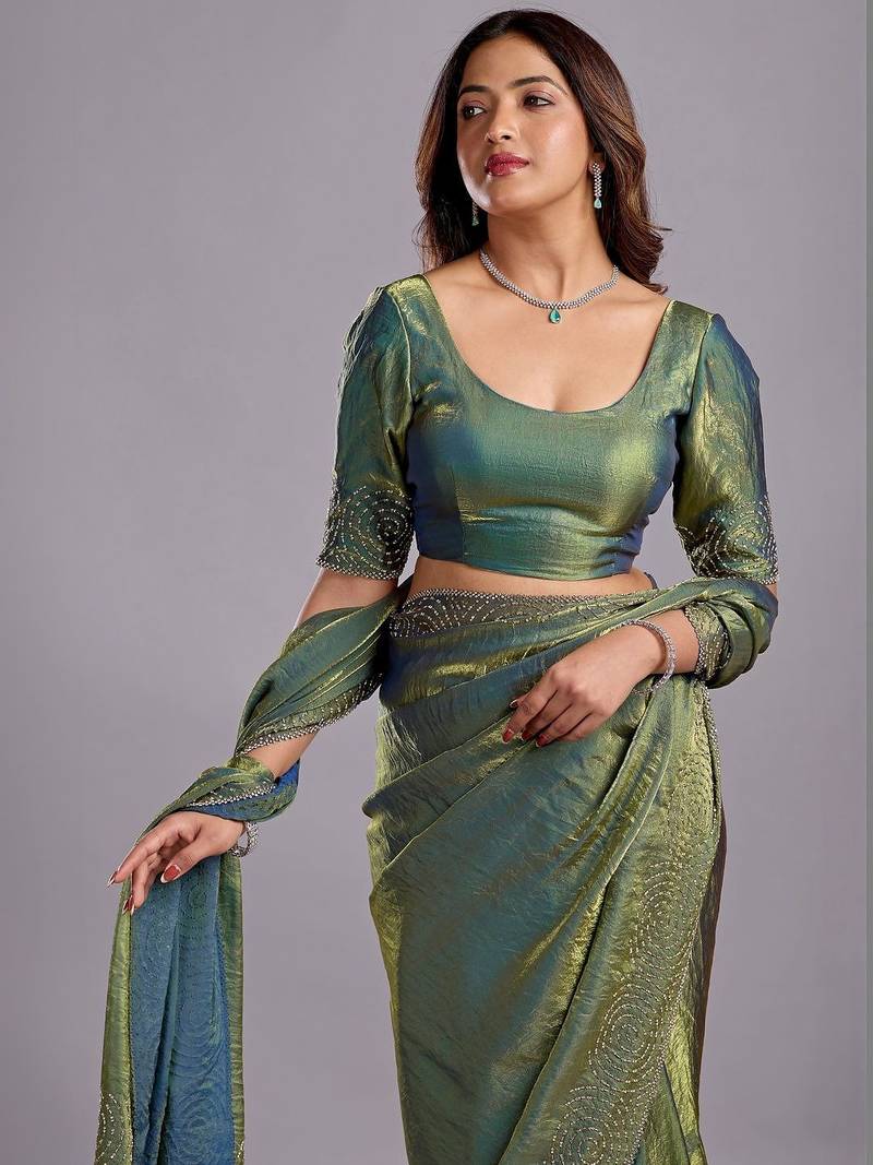 Green embellished sequinned organza heavy work saree
