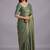 Green embellished sequinned organza heavy work saree